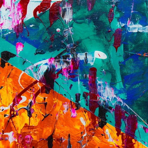 Colorful abstract expressionist painting with acrylics on canvas with vivid splashes.